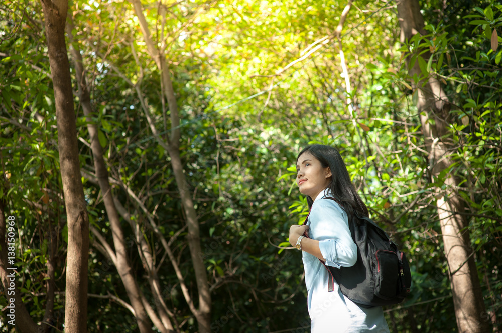 Young beautiful asian women nature in the middle of a meadow,Freedom and relaxing in park Young beautiful asian women nature in the middle of a meadow,Freedom and relaxing in park