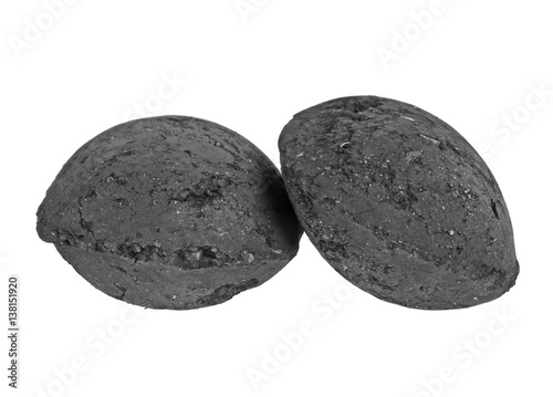 Charcoal briquettes on white background