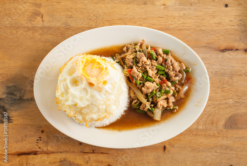 Rice topped with stir-fried pork and basil and Fried egg