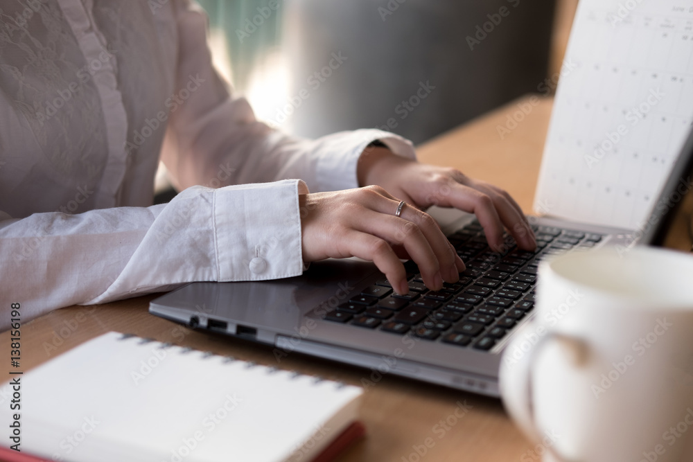 hand of women use a laptop in business concept hand of women use a laptop in business concept