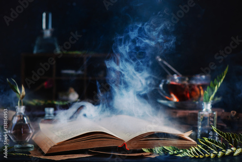 Wallpaper Mural Open spell book with magical smoke
