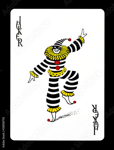 Joker colorful playing card, isolated on black background.