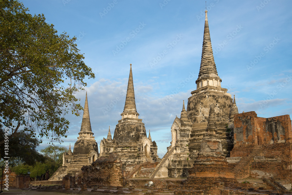 Three ancient stupas of the buddhist temple of Wat Phra Si Sanphet in the early morning. Ayutthaya, Thailand