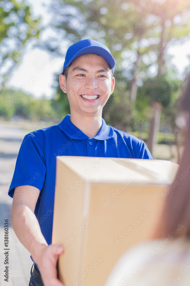 deliveryman stand and smile deliveryman stand and smile