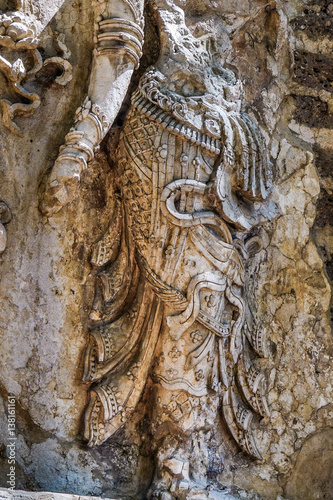 Ancient stucco reliefs of Gods and angels at Jet Yod temple in Chiangmai, Thailand photo