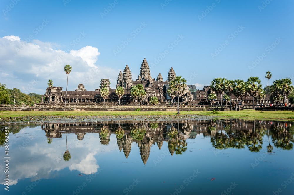 Fototapeta premium Angkor Wat with reflection blue sky. Siem Reap, Cambodia. World Heritage landmark