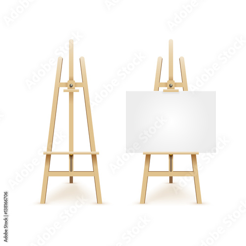 Wooden easel with mock up empty blank canvas isolated on white background
