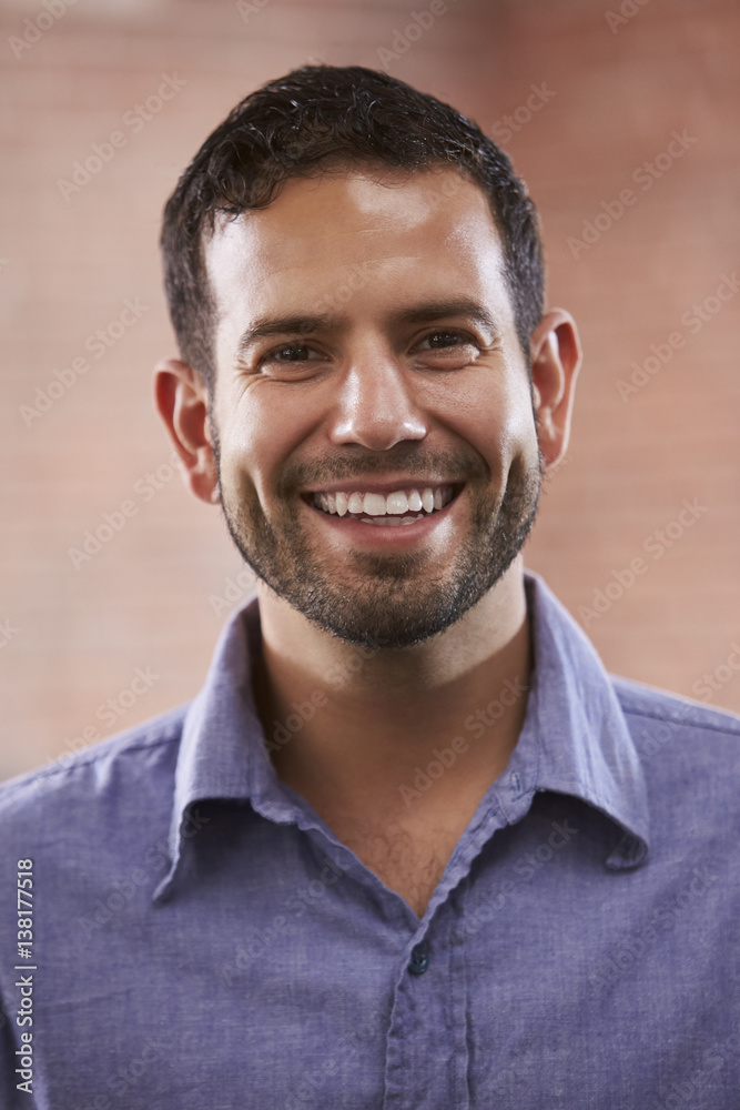 Fototapeta premium Portrait Of Businessman In Office Standing By Window