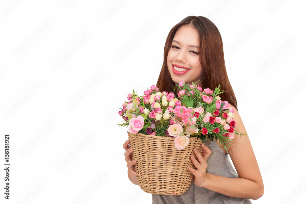 Girl holding a basket of flowers. Girl holding a basket of flowers.