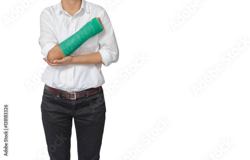 green cast on hand and arm isolated on white background, body injury concept.