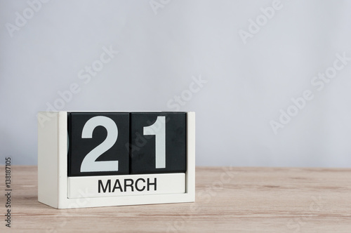 March 21st. Day 21 of month, wooden calendar on light background. Spring time, empty space for text