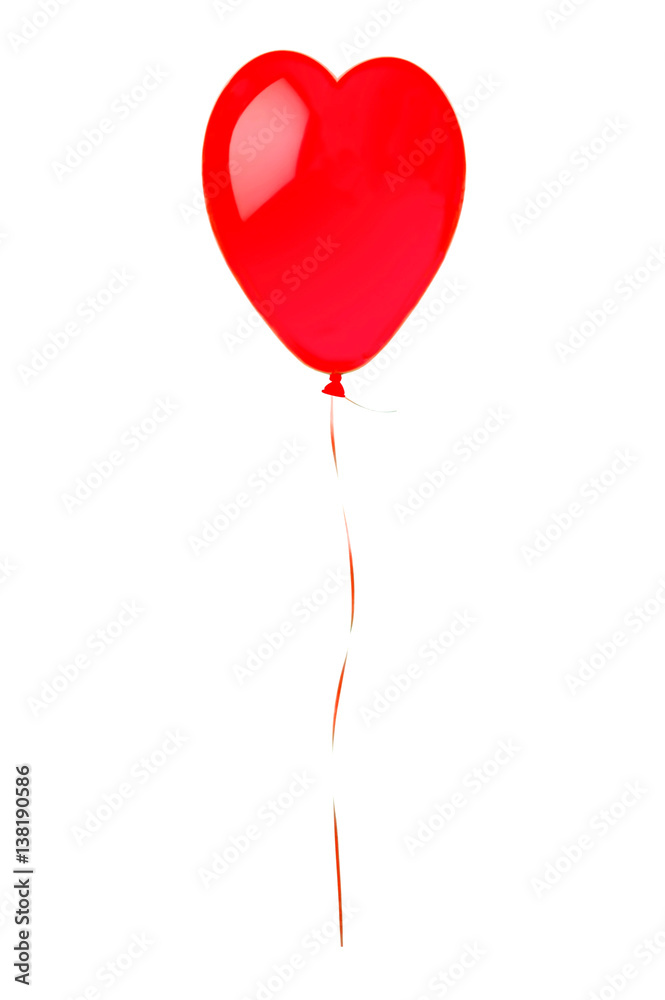 Red flying balloon looking like heart symbol isolated on white Red flying balloon looking like heart symbol isolated on white