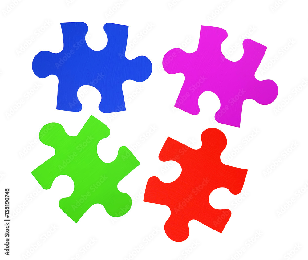 Colorful puzzles closeup isolated on white Colorful puzzles closeup isolated on white