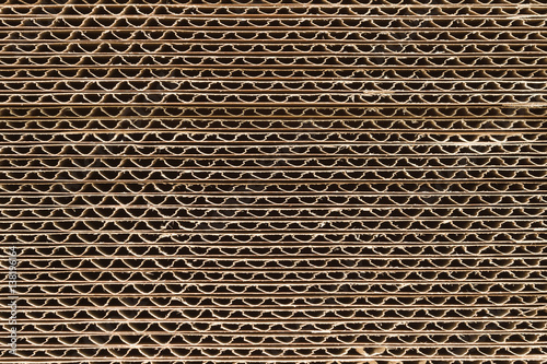 Industrial flat pack single wall cardboard boxes or cartons end view showing the flutes or corrugations