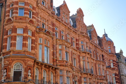 LONDON, UK: Red brick Victorian houses facades in Mount Street (borough of Westminster)