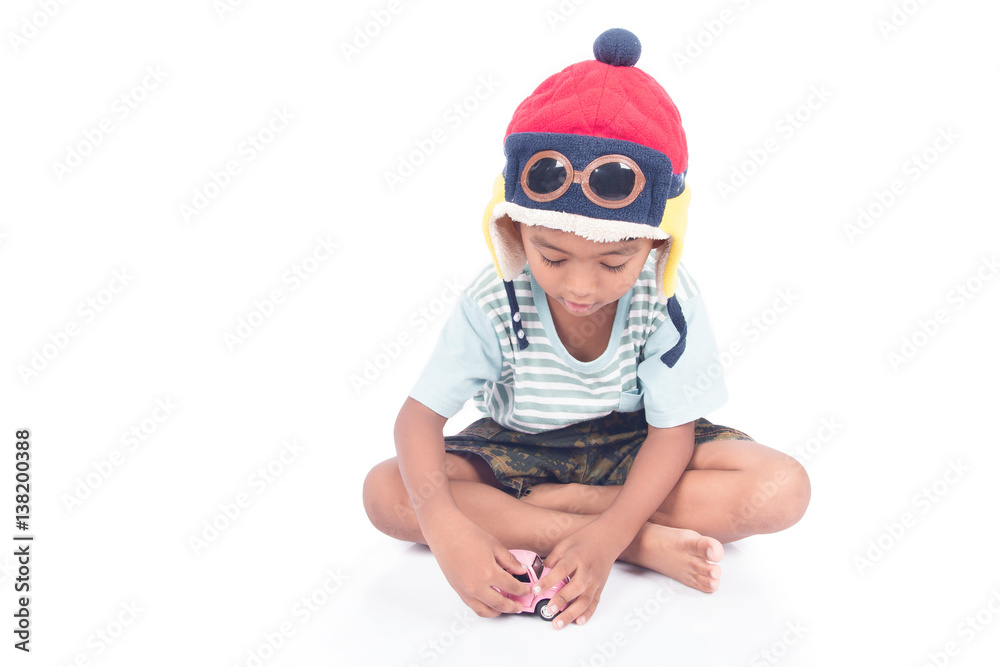 cute asian boy play toy car on white background cute asian boy play toy car on white background