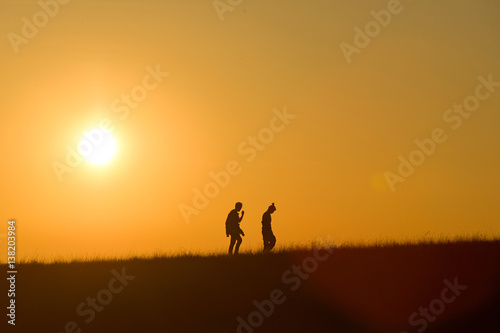 siluate man on mountain