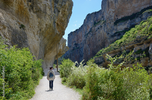 Tourist in the mountain canyon Foz de Lumbier