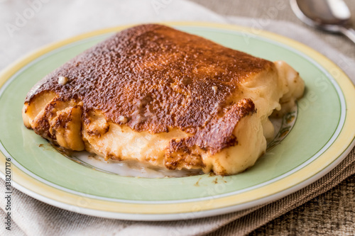 Turkish Dessert Kazandibi / milk baked pudding photo