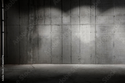 partially lit concrete wall construction site background