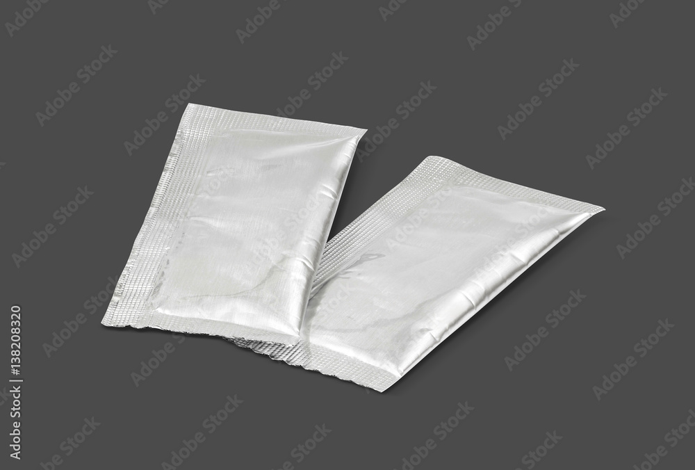 blank packaging sugar foil sachet isolated on gray background