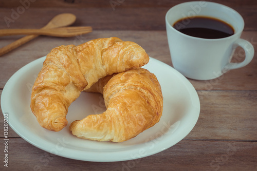 Croissants and coffee cup
