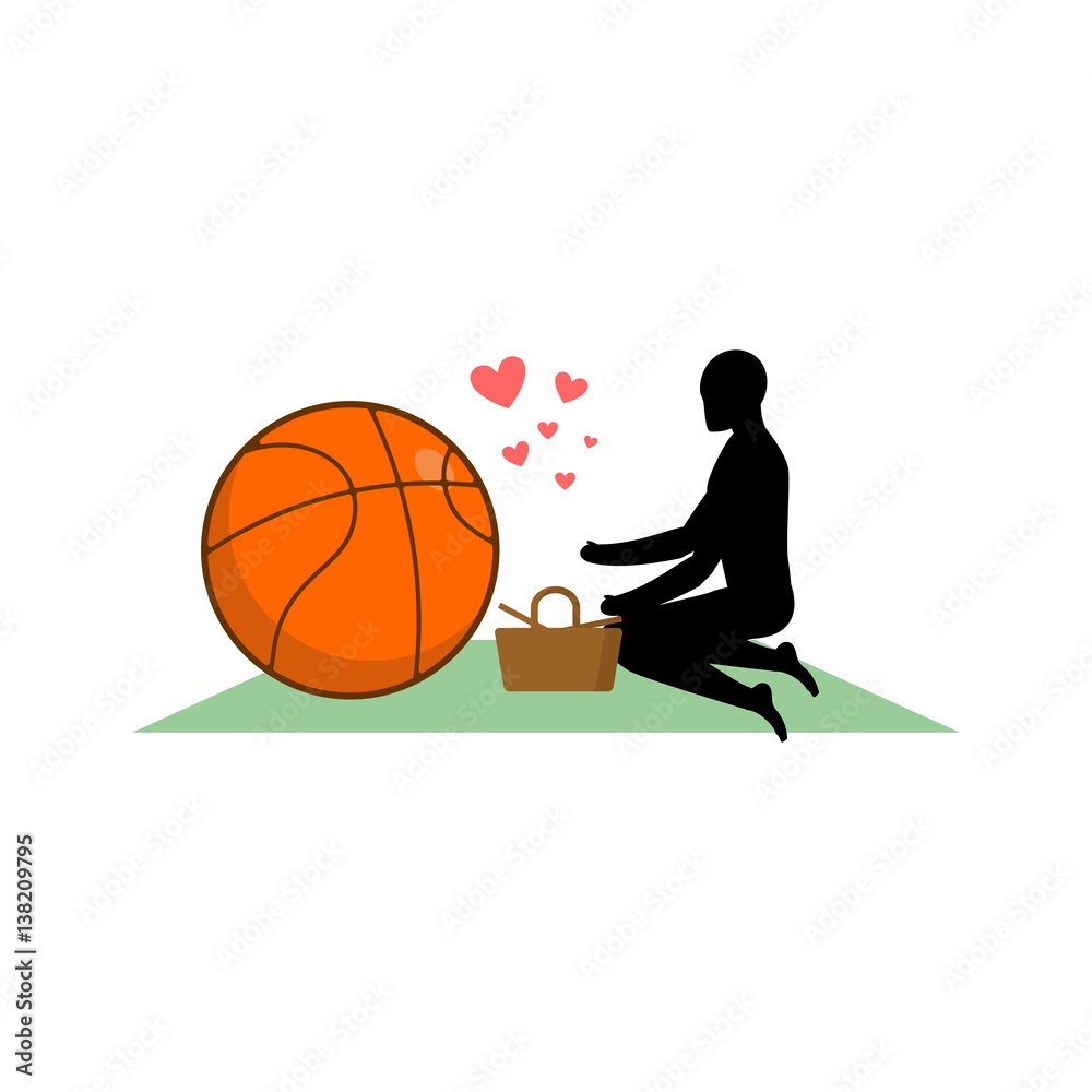 Fototapeta premium Lover Basketball. Guy and ball on picnic. Meal in nature. blanket and basket for food on lawn. Romantic date. Love sport play game