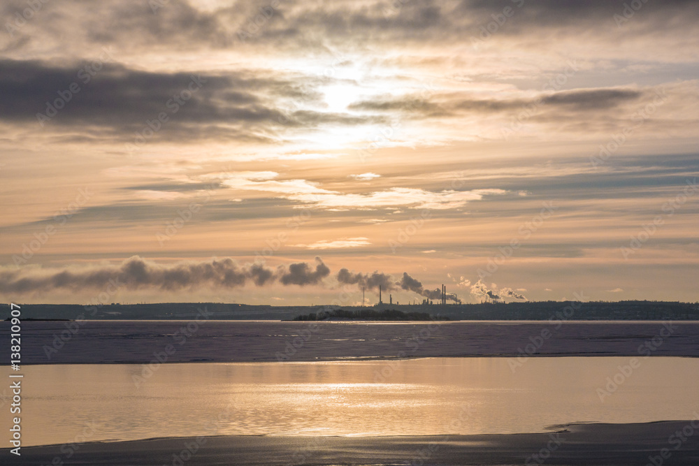 Industrial landscape with smokestacks of factories near Volga river, Saratov, Russia