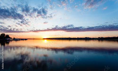 Fototapeta Naklejka Na Ścianę i Meble -  sunset over the town pond