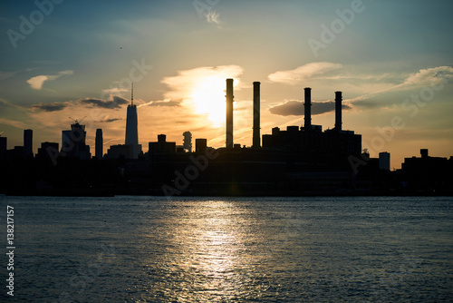 Industrial skyline silhouette from water front
