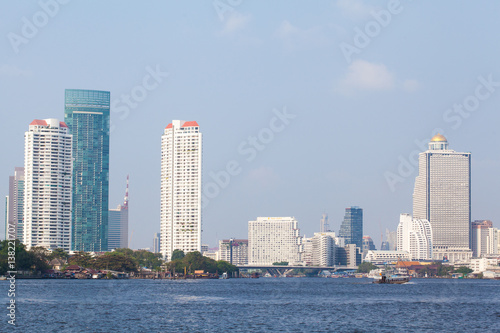 View of Chao Phraya River with Bangkok in the background.