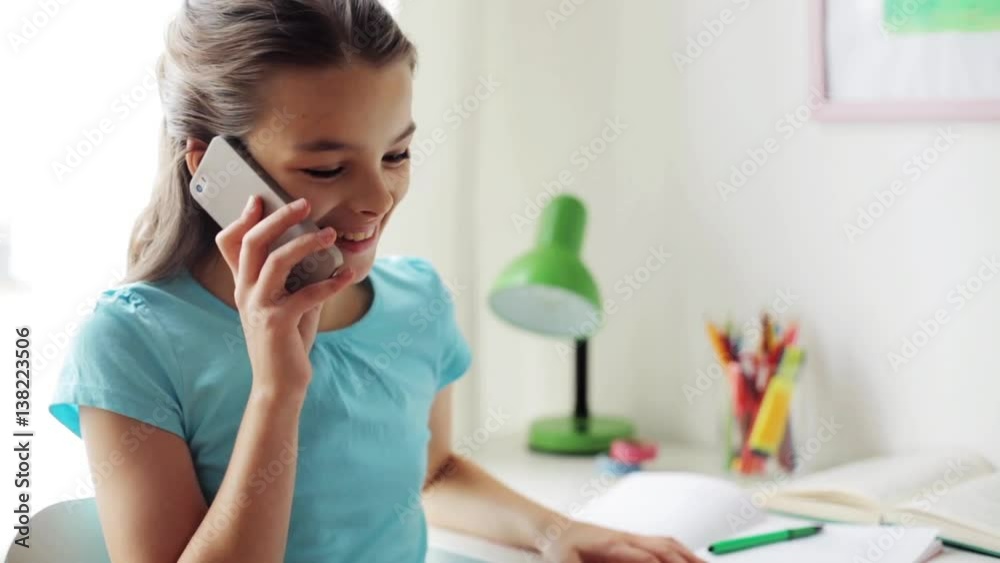 smiling girl calling on smartphone at home smiling girl calling on smartphone at home