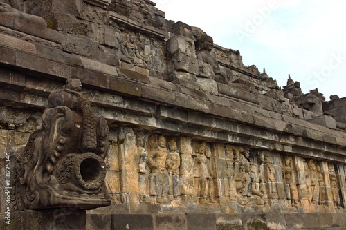 Buddha statue in stupa, Borobudur, near Yogyakarta, Java, Indonesia/Borobudur temple stupas near Yogyakarta, Java, Indonesia