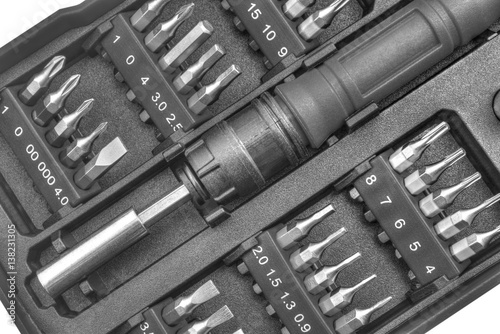 Mechanical bit tool set in black and white closeup
