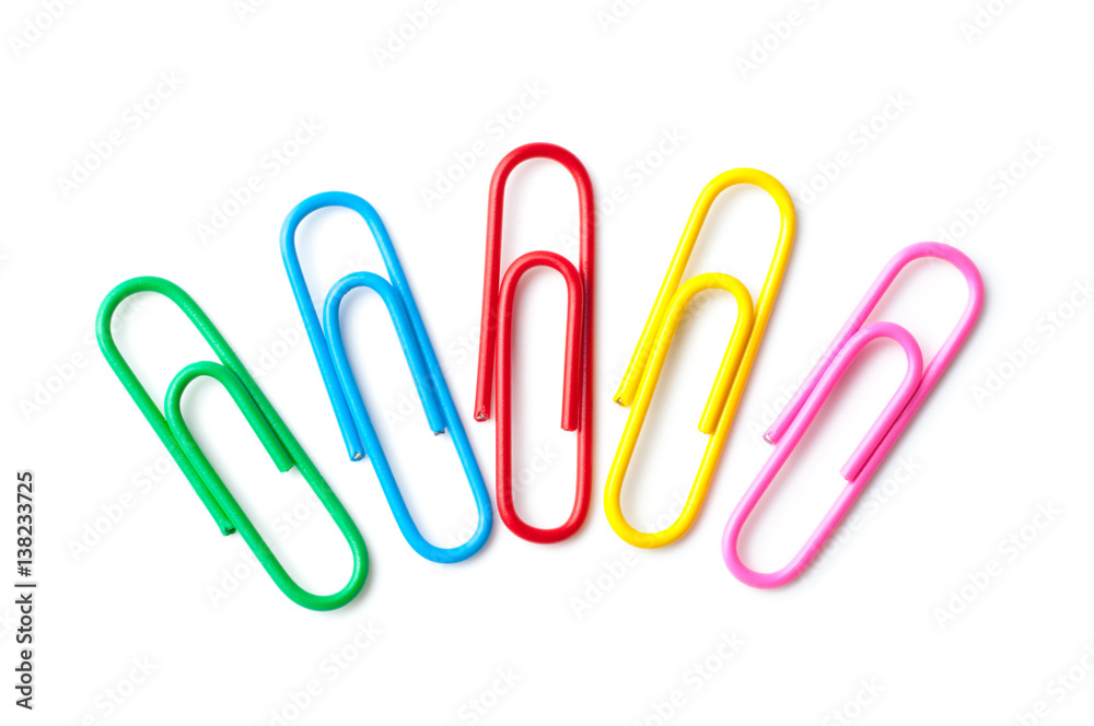 Colored paper clips macro close up isolated on a white background Colored paper clips macro close up isolated on a white background