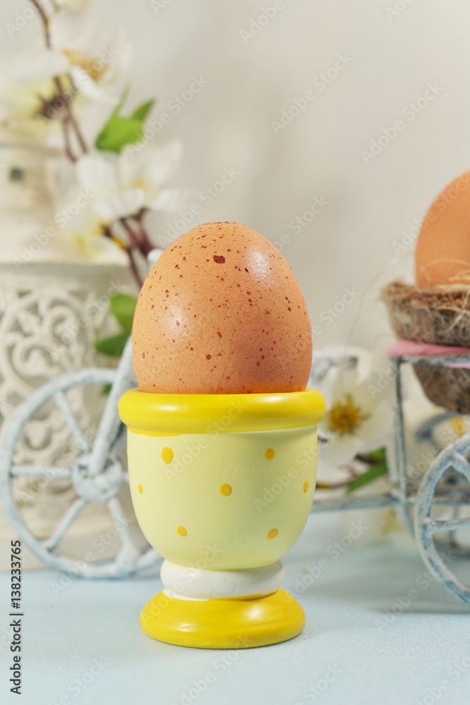 Egg in a eggcup , the Easter breakfast he and background of Easter composition,
Egg in a eggcup , the Easter breakfast he and background of Easter composition,
