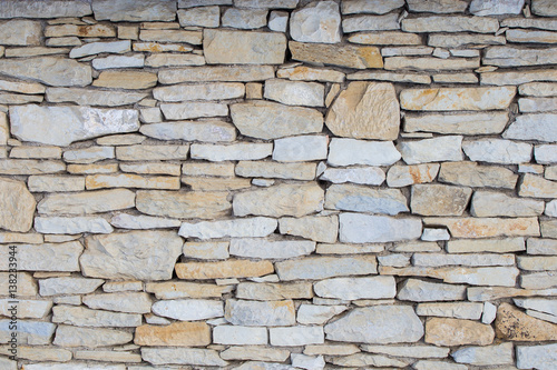 Stone wall. Outdoor background natural stone - sandstone