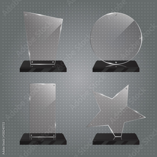 Set of realistic transparent glass trophy awards standing on black base and isolated on gradient background. Different shapes provided. Star, rectangle, round, polygon. Vector illustration.