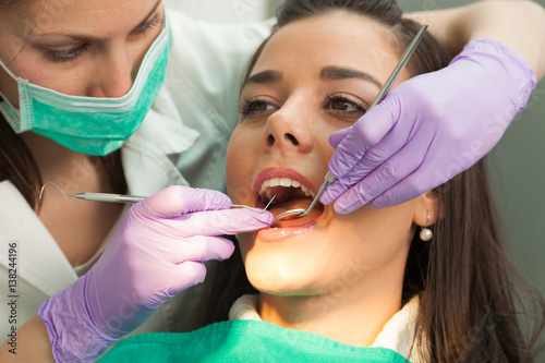 Schilderij op canvas Patient and dentist in the dental practice