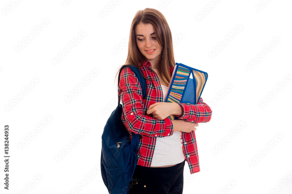 tired stylish student girl with backpack on her shoulders and folder ...