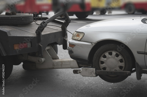 police department tow truck delivers the damaged vehicle