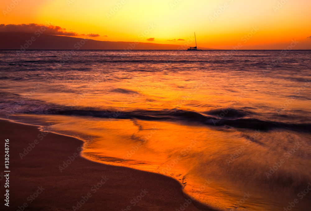 Waves and orange sunset