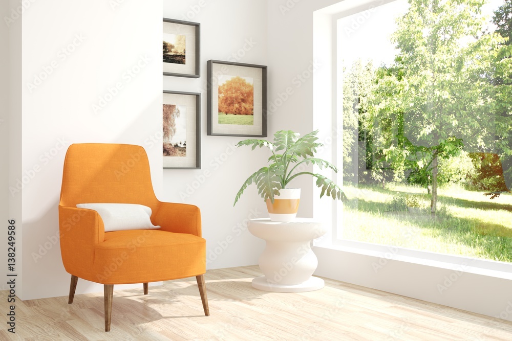 White room with armchair and green landscape in window. Scandinavian interior design White room with armchair and green landscape in window. Scandinavian interior design