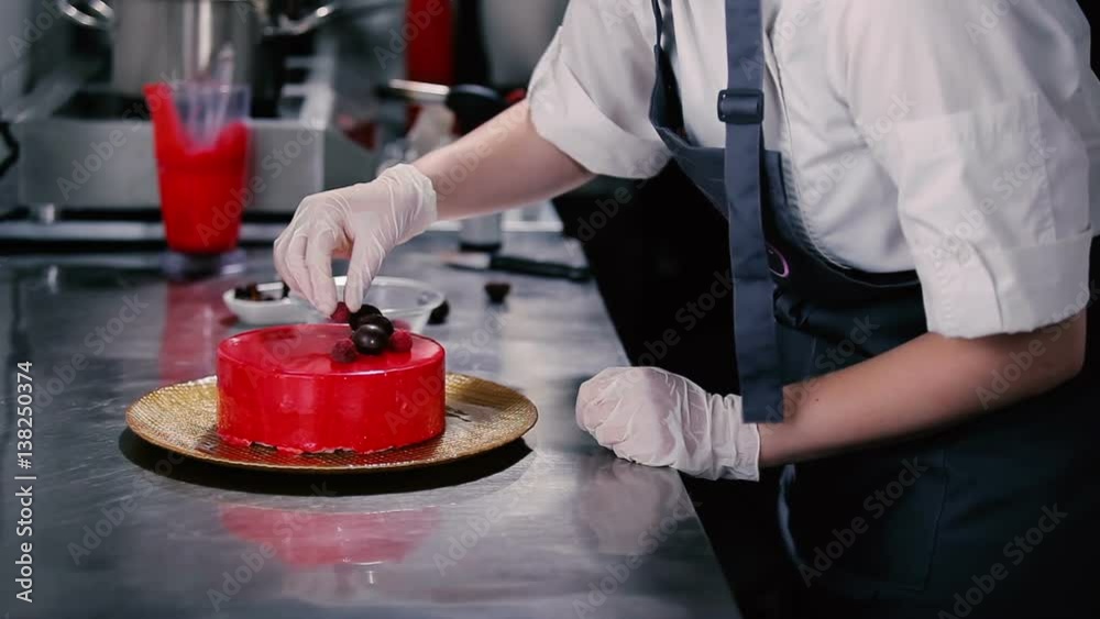 Konditer adorns the top of the cake raspberries. Konditer adorns the top of the cake raspberries.