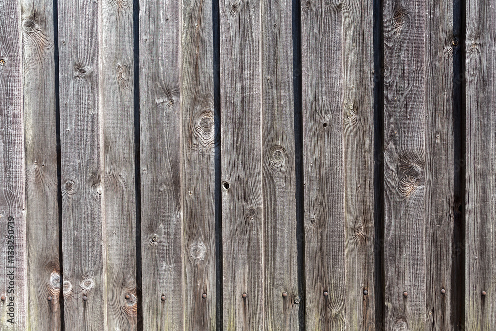 Obraz premium Hintergrund, vertikal ausgerichtete Holzbretter mit Struktur, grau schwarz