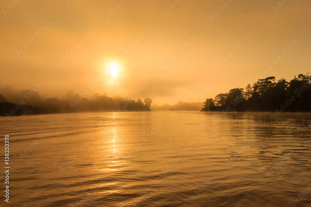 Sunrise over the rain forest and Kinabatangan River