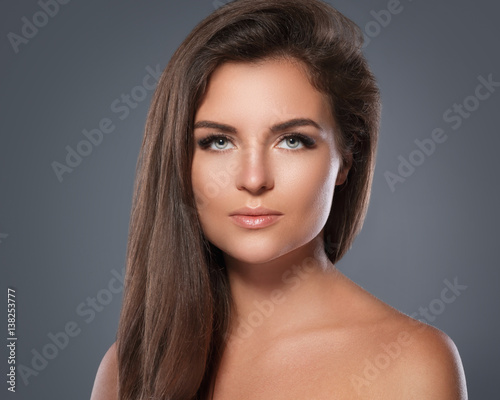 Beautiful  and young woman with a artificial eyelashes