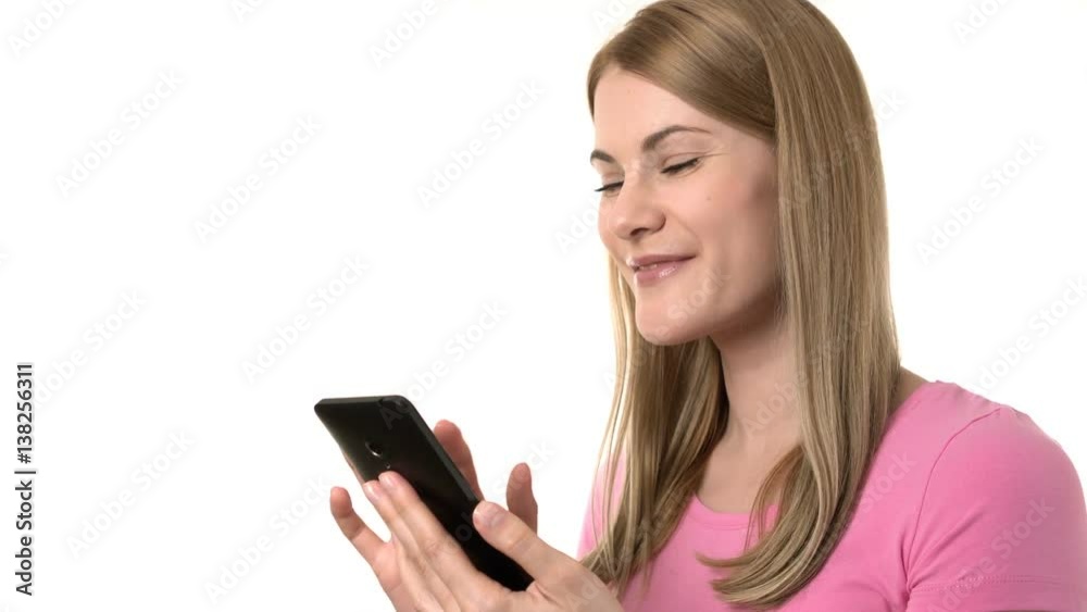 Beautiful woman with smartphone. Browsing internet, communicating with friends. Isolated background. Beautiful woman with smartphone. Browsing internet, communicating with friends. Isolated background.