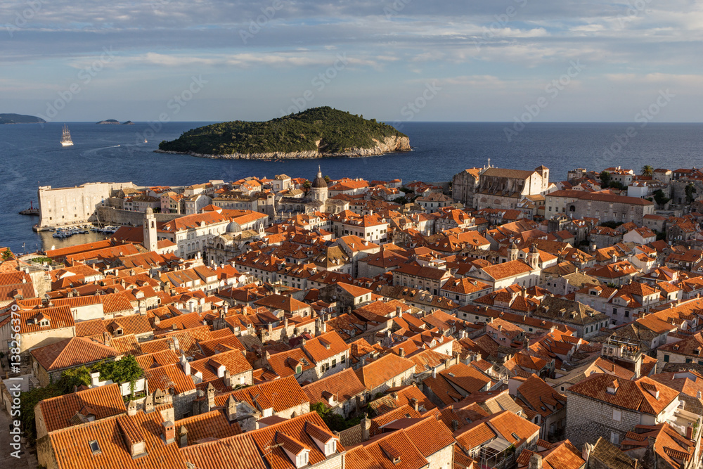 View over red roofs of the historic Old Town in Dubrovnik, Croatia, in the late afternoon.