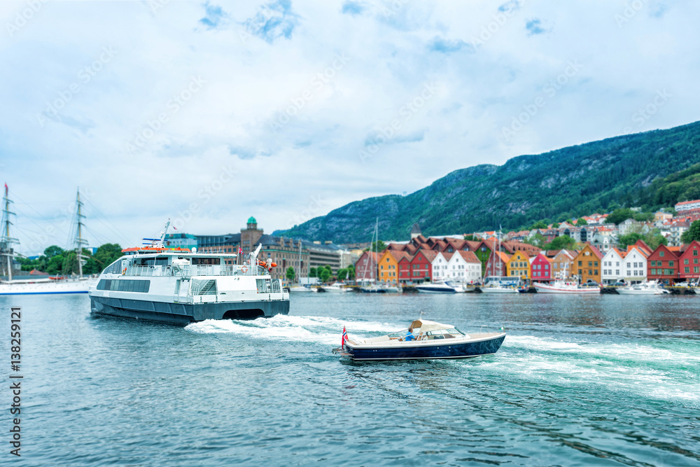 Bryggen street with boats in Bergen, Norway